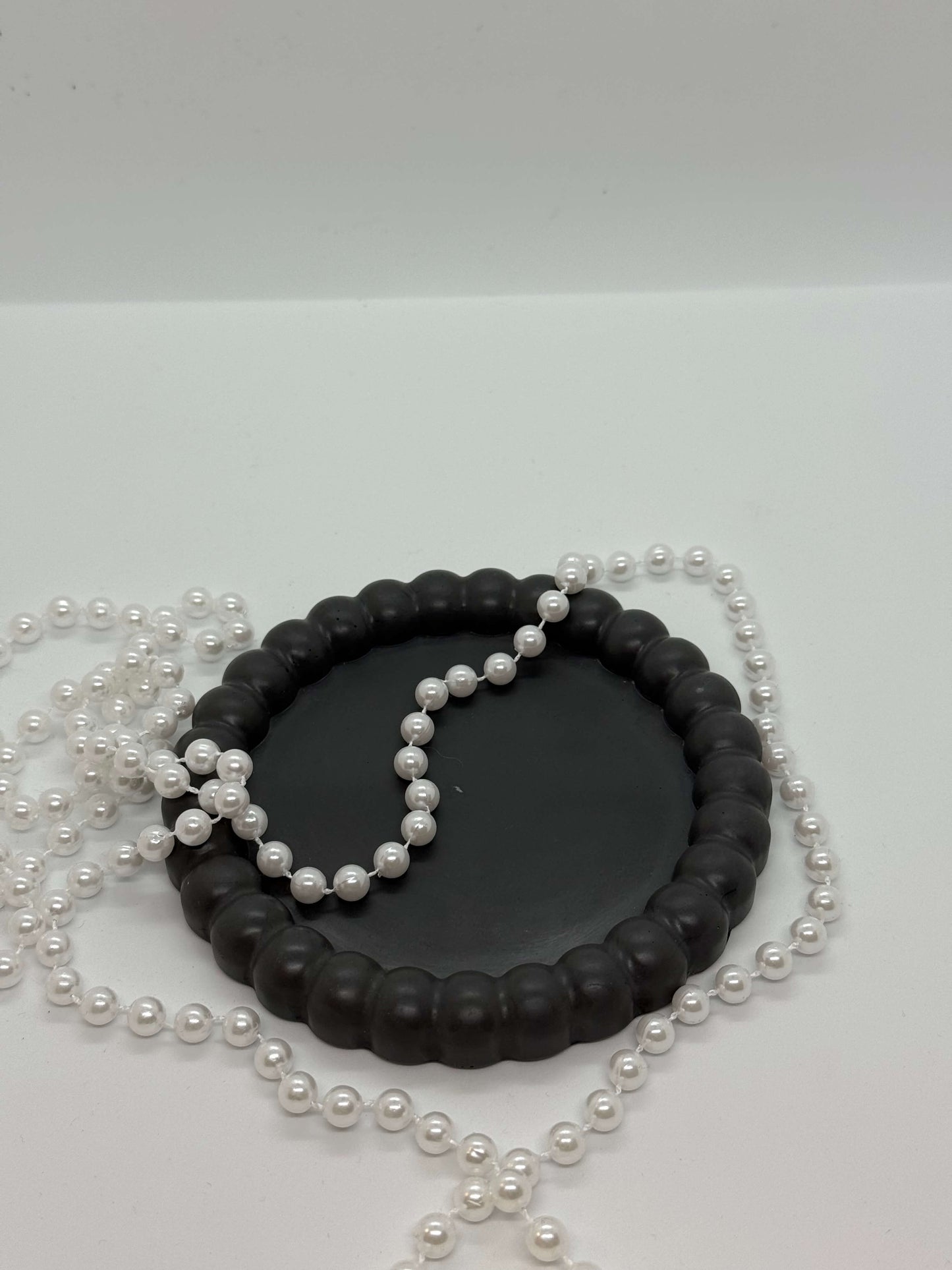 Apvalus padėkliukas banguotu kraštu